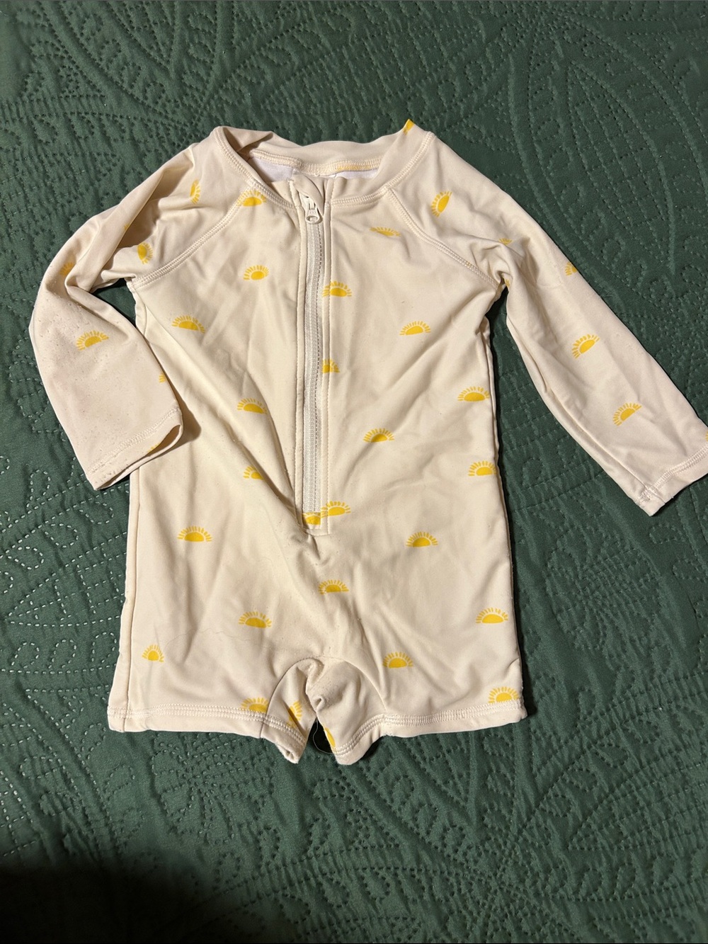 Kids Long-Sleeve One-Piece Swimsuit in Cream with Yellow Sun Prints